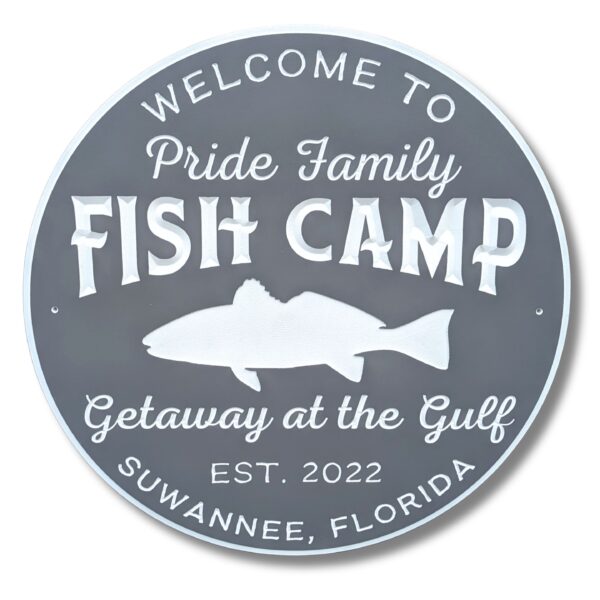 The personalized round sign for Pride Family Fish Camp in Suwannee, Florida, showcases a charming fish image with Welcome to Pride Family Fish Camp - Getaway at the Gulf - Est. 2022, embodying coastal charm and inviting relaxation like classic beach house decor.