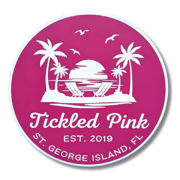 The round pink logo features white graphics of palm trees, a sunset, water, and birds, creating a Beach House Sign vibe with text: Tickled Pink, Est. 2019, St. George Island, FL, similar to the Personalized Custom Round Beach House Sign Coastal Decor.