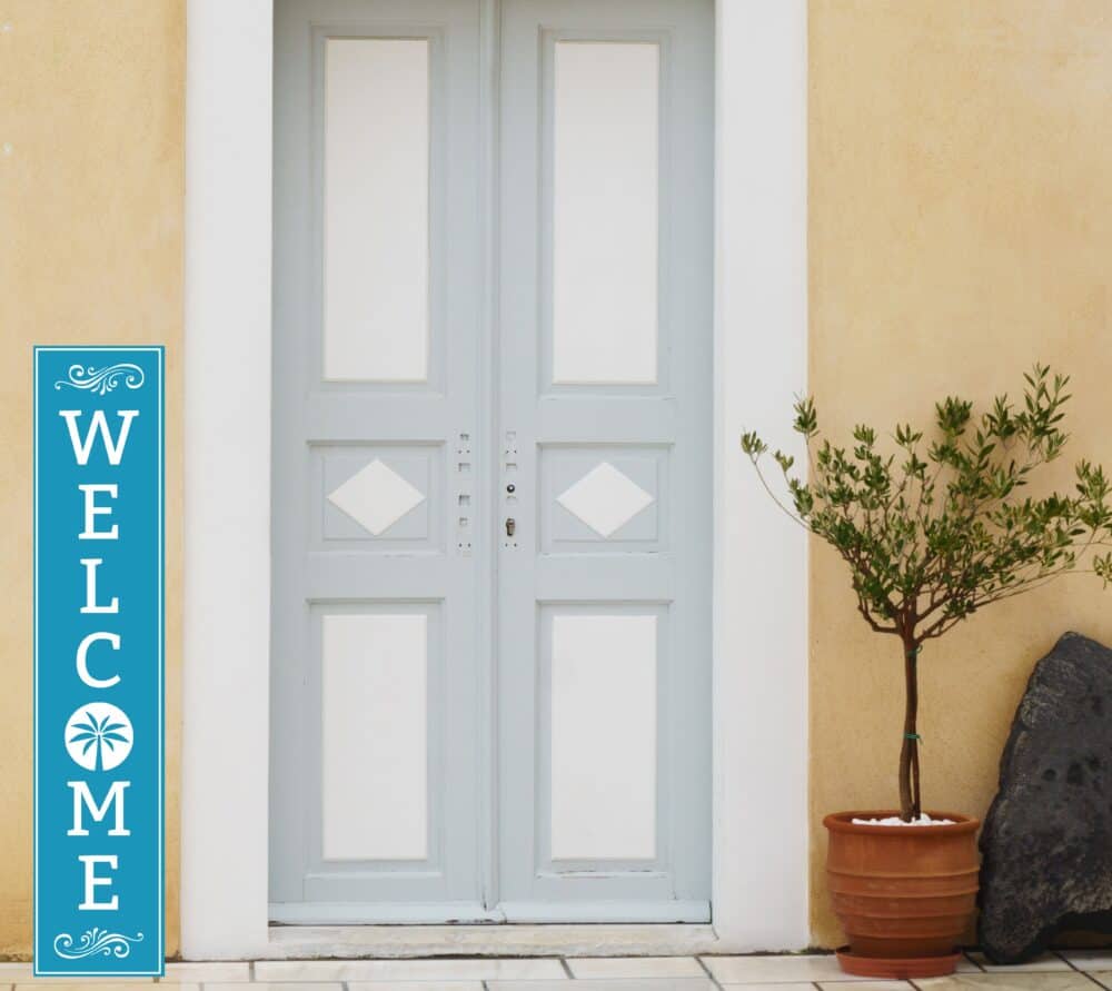 welcome sign with sand dollar