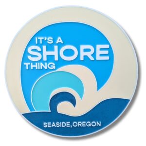 The Personalized Custom Beach House Sign displays Its a Shore Thing in white on light and dark blue waves, with Seaside, Oregon elegantly written below in white against a deeper blue background.