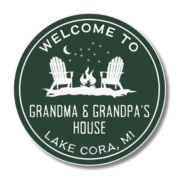 Green circular sign reading Welcome to Grandma & Grandpas House, Lake Cora, MI with two Adirondack chairs and a campfire under a moon and stars, showcasing the charm of Personalized Oval Custom Beach House Signs Coastal Decor.