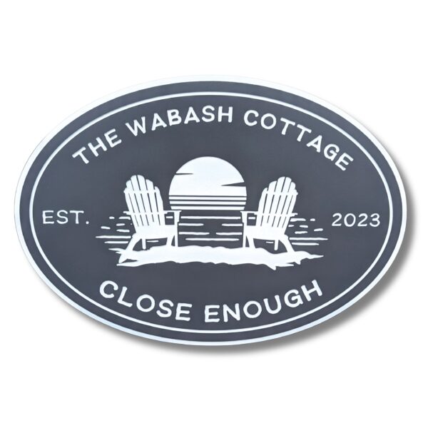 Personalized Oval Custom Beach House Sign: The Wabash Cottage with two Adirondack chairs by a sunset, text Est. 2023 and Close Enough. Ideal for adding a quaint, tranquil seaside charm to any beach house.