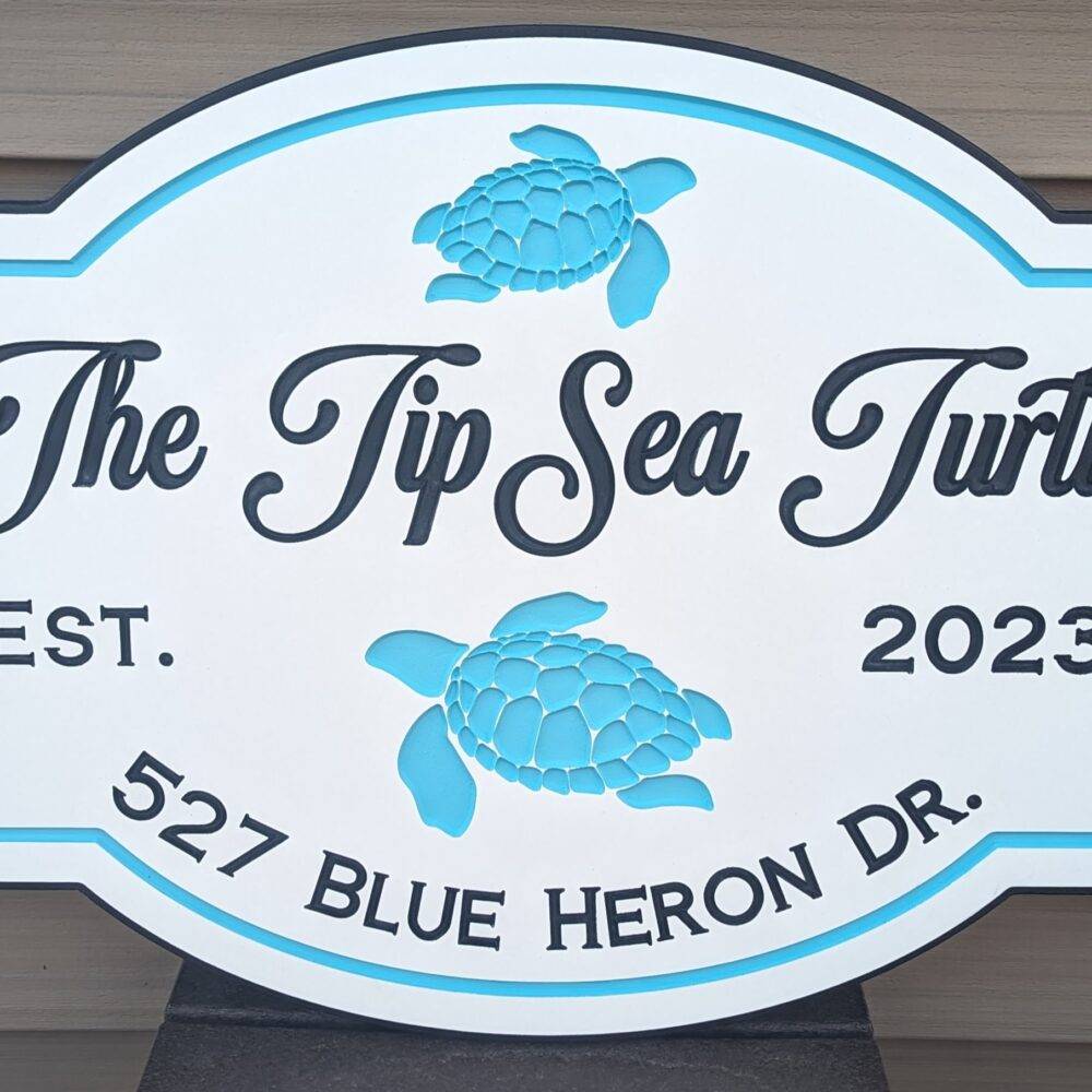 the tip sea turtle sign