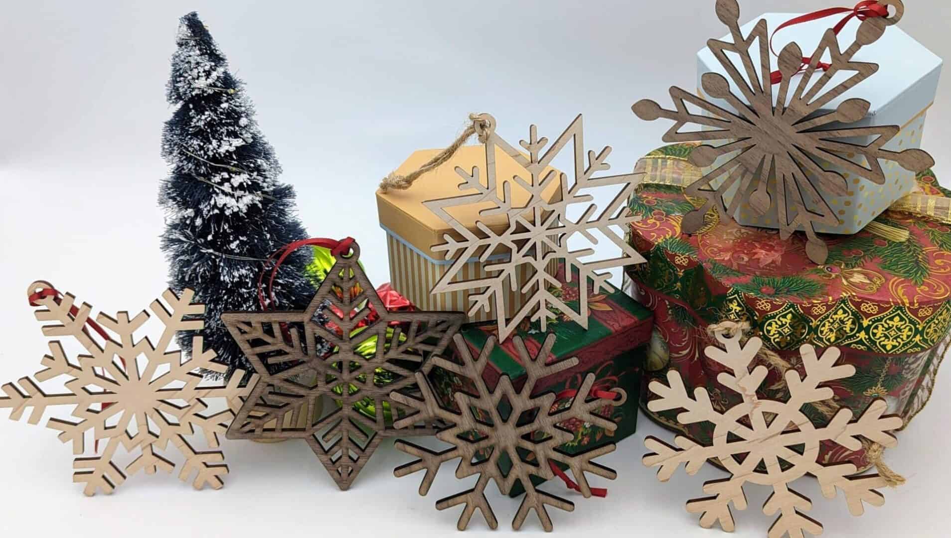 A group of wooden snowflakes sitting next to each other.