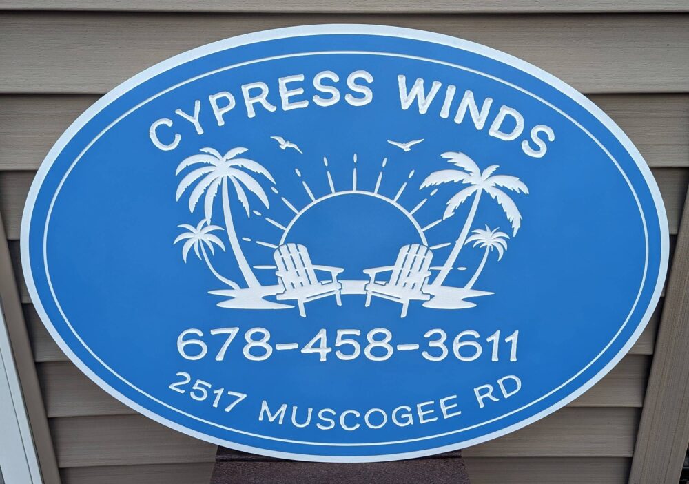 A sign for cypress winds in the sun