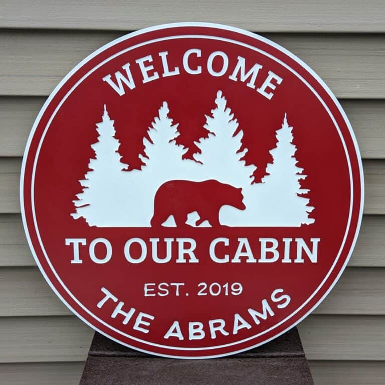 welcome to our cabin sign with bear