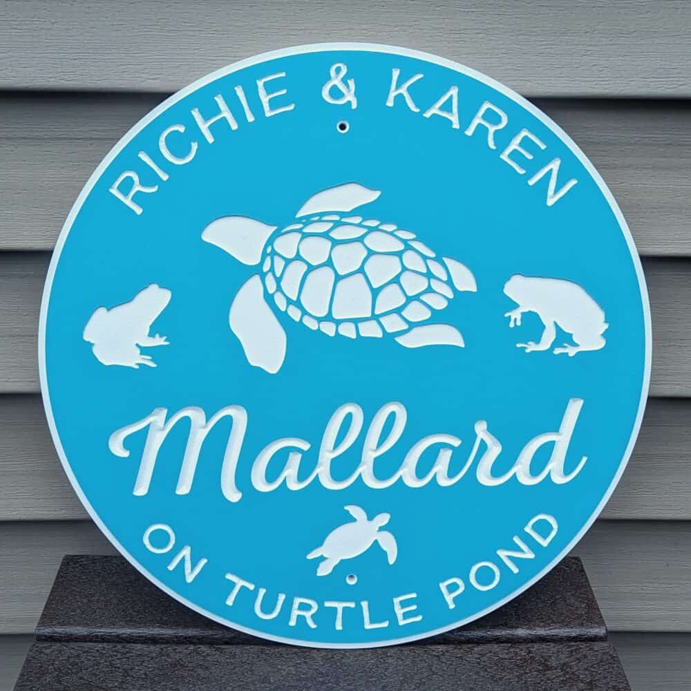 custom sign with turtle and frogs