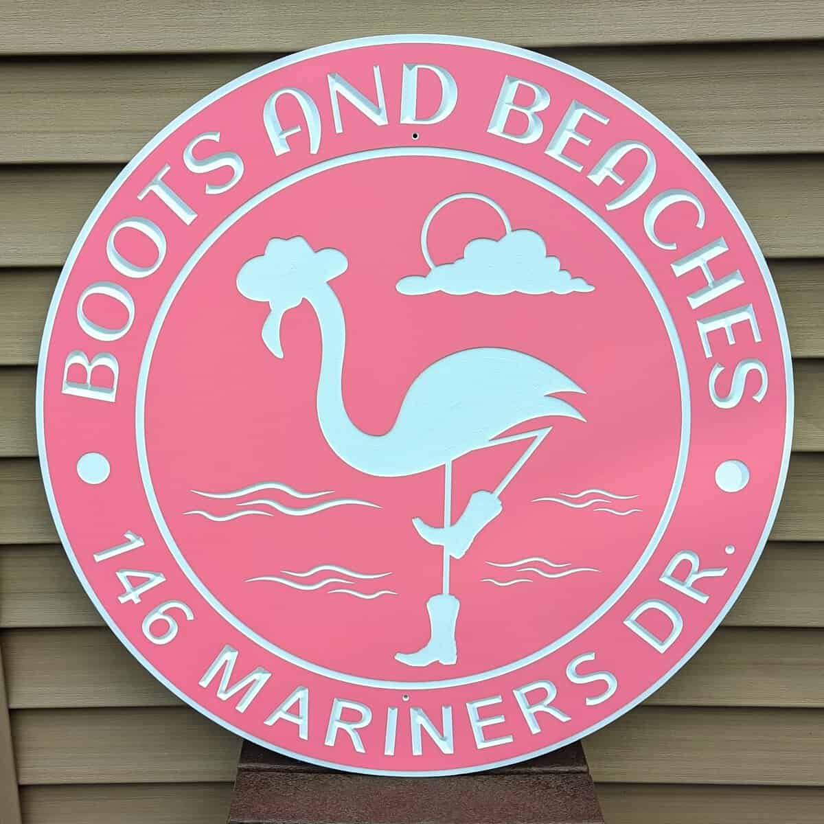 boots and beaches pink address sign