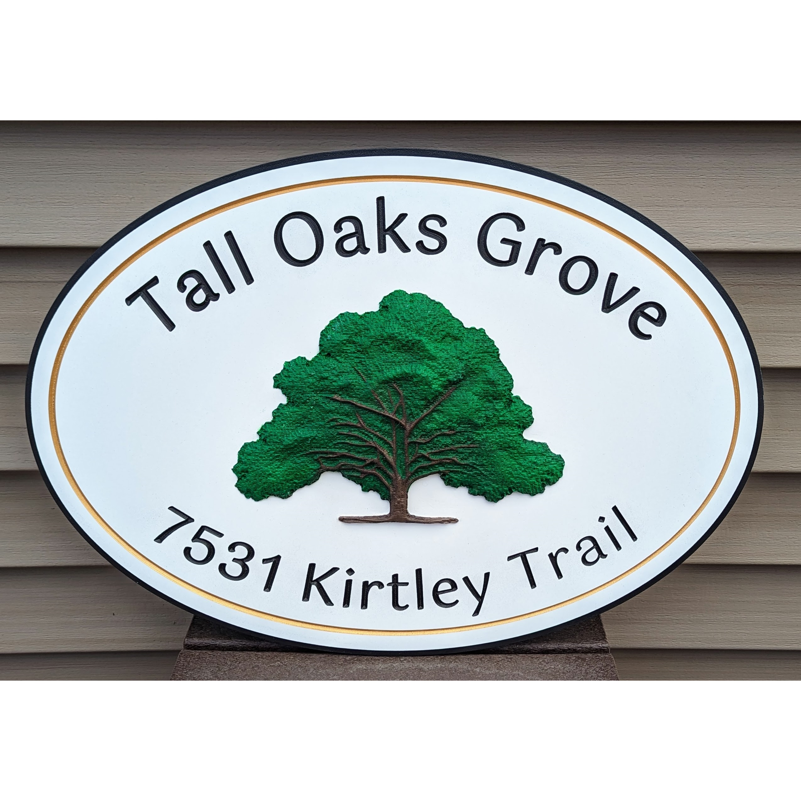 Personalized 3D Image Sign with a green tree illustration on a white oval background and thin gold border. Custom engraved with Tall Oaks Grove above and 7531 Kirtley Trail below—ideal for your home or business.