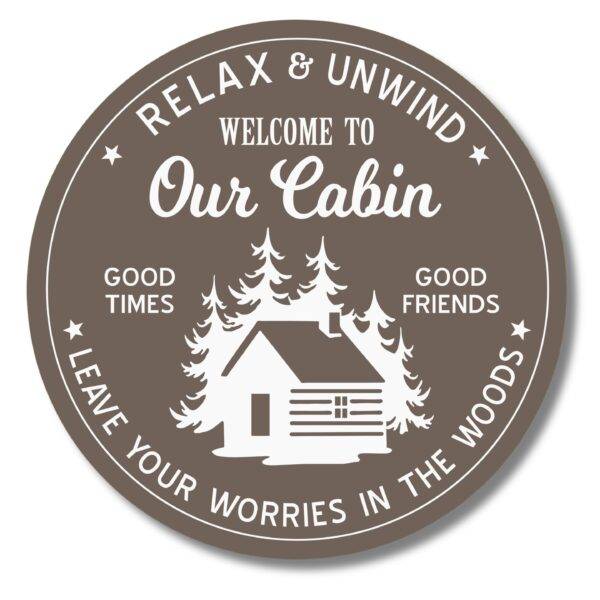 The Custom Carved Round PVC Cabin Sign displays a serene cabin and tree silhouette with the text: Relax & Unwind. Welcome to Our Cabin. Good Times. Good Friends. Leave Your Worries in the Woods. Its designed with a brown background and white graphics, ideal for personalizing your retreat space.