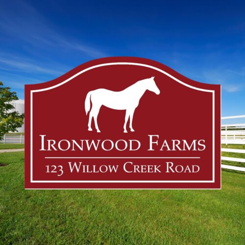 Showcase your style with the Personalized Oval Beach House Sign – Custom Coastal Decor for Your Beachfront Home, featuring a red oval sign, white horse silhouette, “Ironwood Farms, 123 Willow Creek Road,” and a scenic green grass and blue sky background.
