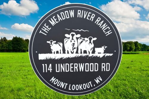 Personalized Oval Beach House Sign – Custom Coastal Decor for Your Beachfront Home; features your chosen name and address, with silhouettes of cows and grass, ideal as a unique beach house sign. Set against a green field and blue sky backdrop.